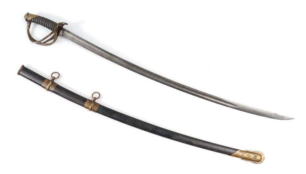 CIVIL WAR PRESENTATION CAVALRY OFFICERS SWORD: CIVIL WAR PRESENTATION CAVALRY OFFICERS SWORD: Ornate presentation quality 1860 cavalry officers sword with brass hilt with traces of gilt remaining in protected areas, engraved on side of knuckle gua