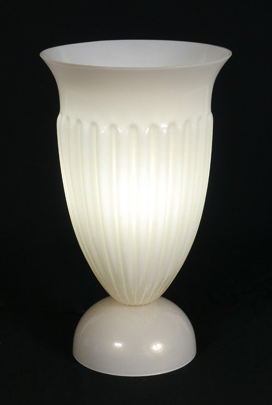 BAROVIER & TOSO TORCHIERE LAMP: BAROVIER & TOSO TABLE TOP TORCHIERE LAMP: White glass with with metallic flecks. Barovier & Toso label on the underside. Measures 17" tall, 10" dia.
