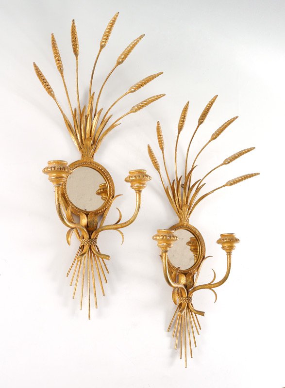HOLLYWOOD REGENCY GILT CANDLE SCONCES: GOLD GILT MIRRORED CANDLE SCONCES: Hollywood Regency style gilt metal with stalks of wheat over mirror over 2 light candle holders. Overall measures 24 1/4" h. x 12" x 4".