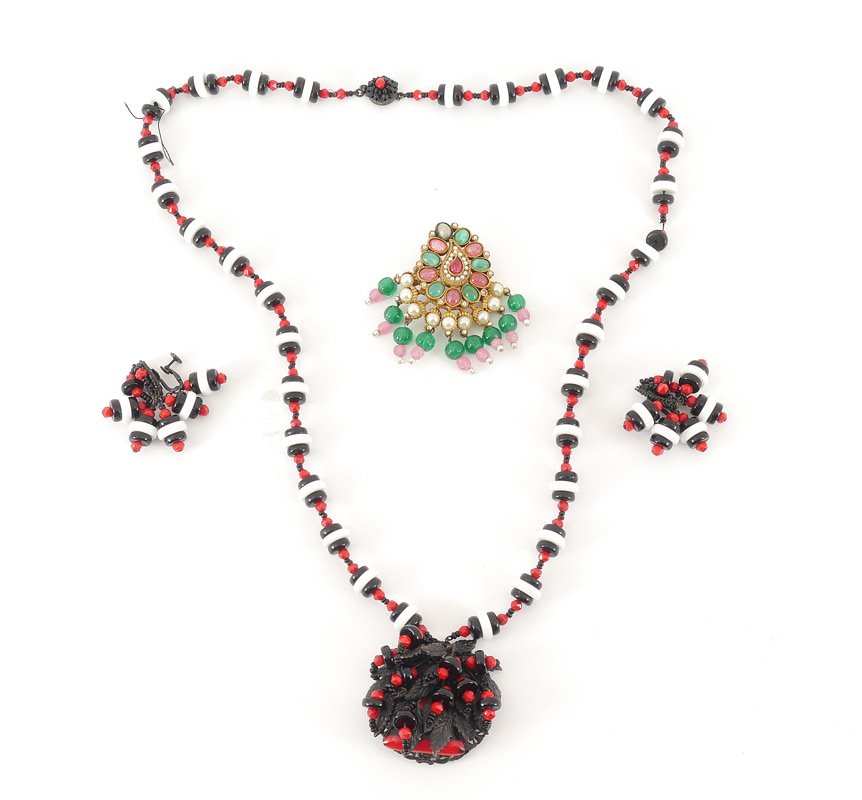 MIRIAM HASKELL & KENNETH J LANE JEWELRY: MIRIAM HASKELL AND KJL: 1) Miriram Haskell black, red and white glass bead pendant necklace and earrings. Signed on clasp and pendant. Necklace is 30" length with 2" pendant. 2) Kenneth J Lane bead an