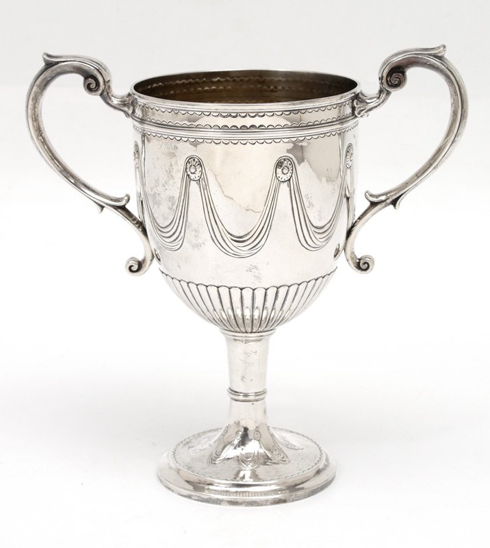 1804 MOSES BRENT ENGLISH SILVER LOVING CUP: 1804 MOSES BRENT ENGLISH STERLING SILVER LOVING CUP: George III period, hallmarked 1804 London and makers mark for Moses Brent. Double handle loving cup or trophy embossed swags on body with gadroon l