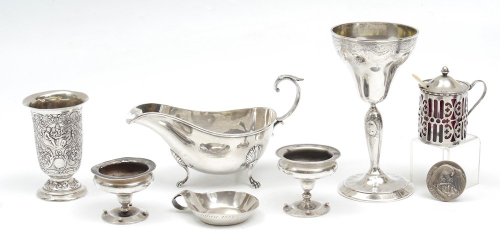 8 PC COLLECTION OF AMERICAN & CONTINENTAL SILVER: 8 PIECE COLLECTION OF AMERICAN & CONTINENTAL SILVER: An assembled estate collection, highlights to include Gorham gravy boat, German embossed cup, unmarked engraved chalice, master salt with cranberry