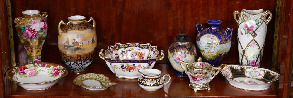 COLLECTION NIPPON HAND PAINTED CHINA: COLLECTION NIPPON HAND PAINTED CHINA: 11 piece assembled group to include serving bowls, vases, covered sugar, open creamer, leaf tray. Tallest vase 10" h. x 6", largest handled vase 3 7/8" h x 10 1/4