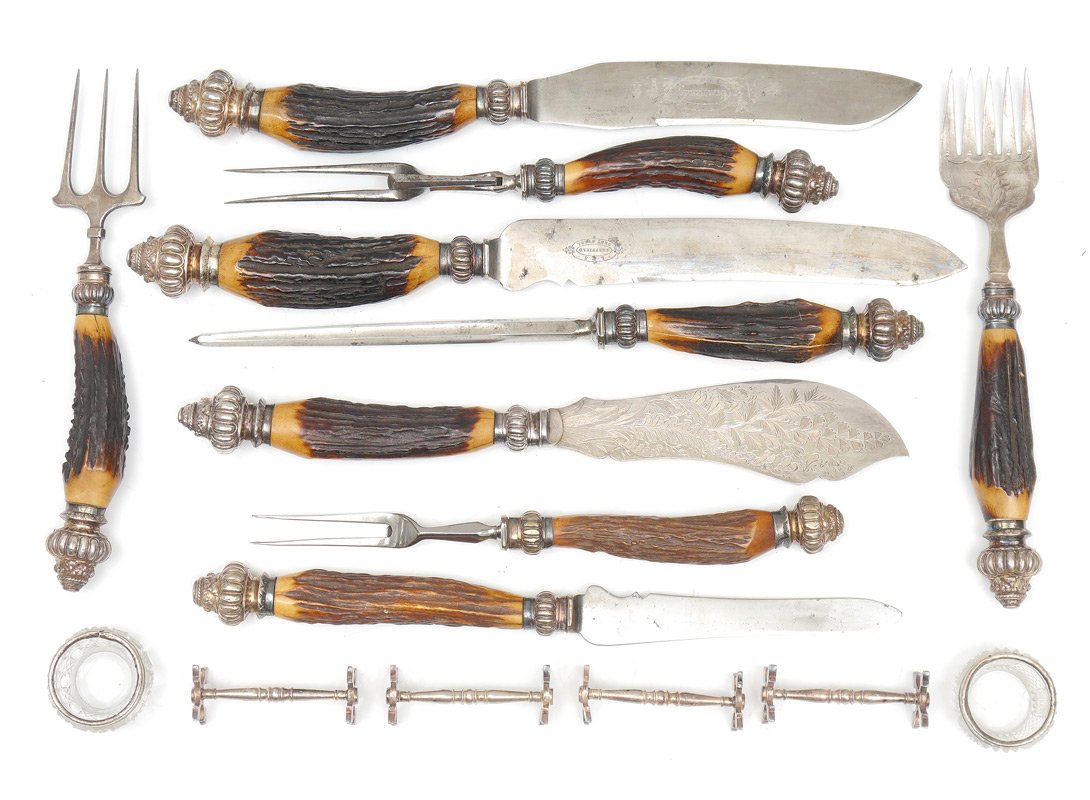 VICTORIAN ANTLER HANDLED CUTLERY SET: VICTORIAN ANTLER HANDLED CUTLERY SET: 15 piece matched set to include, meat knives and forks, etched fish set, spike and bread knife, all with antler handles and silver caps; two cut glass salts with 