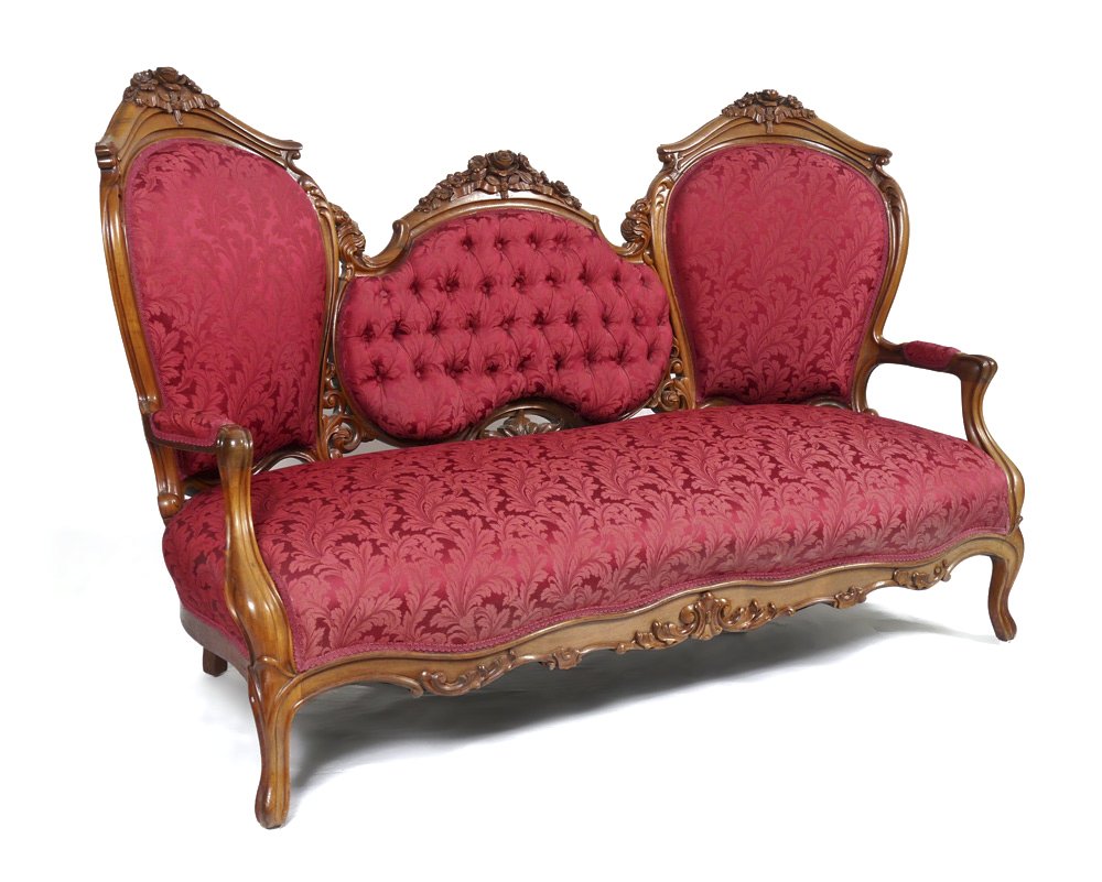 ROSEWOOD CARVED VICTORIAN SETTEE: ROSEWOOD CARVED VICTORIAN SETTEE: Triple back with carved top rail with floral decoration, shaped supports, carved apron. Burgundy acanthus leaf motif upholstery with tufted center back. Measures 42 1