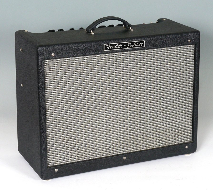 FENDER HOT ROD DELUXE AMPLIFIER: FENDER HOT ROD DELUXE AMPLIFIER: Tube amplifier by Fender, serial number B-301636, made in Mexico. Sold with the foot pedal & original cover. Measures 21 1/2'' x 23 1/2'' x 9 3/4''.