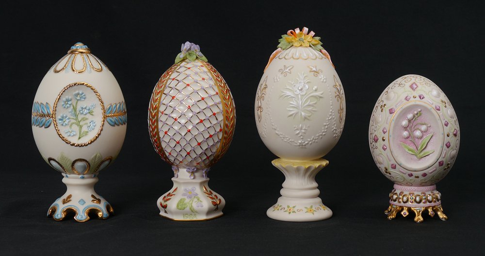 4 CYBIS PORCELAIN EGGS 1983-1986: GROUP OF 4 CYBIS PORCELAIN EGGS: Dated 1983-1986. Cake frosting type decoration, well signed Cybis USA. Measures approx 5"-6 1/2".