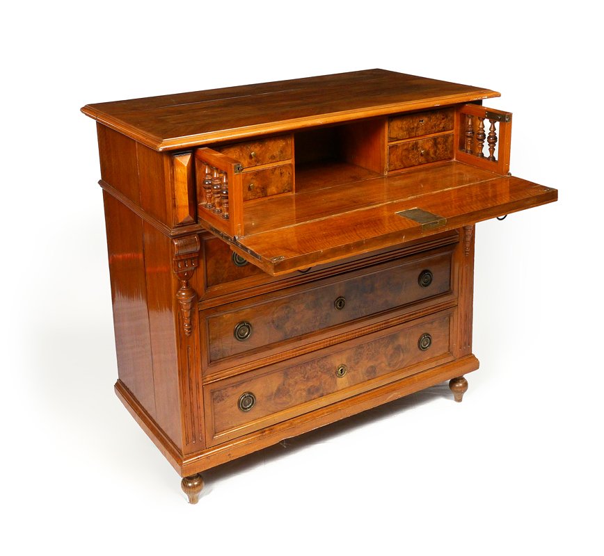 BURL WOOD BUTLERS DESK: BURL WOOD BUTLERS DESK: Top with bookmatch veneer trim, burl veneer front with carved stiles. Top drawer opens to writing surface, 4 internal drawers and cubby hole, over 3 full length drawers on legs