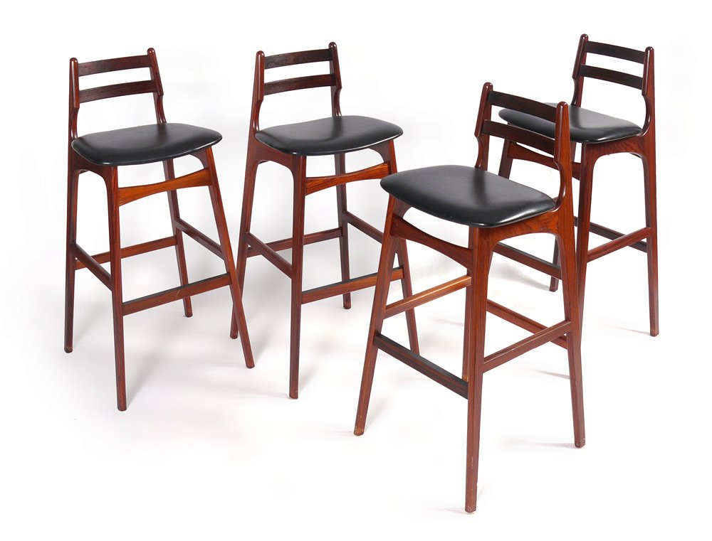 4 DANSK ROSEWOOD MID CENTURY BAR STOOLS: 4 DANSK ROSEWOOD MID CENTURY BAR STOOLS: Tall stools with tapered back, black leather seats. Measures 39'' h. x 16'' x 15 1/4''.