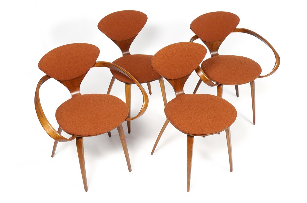 4 NORMAN CHERNER FOR PLYCRAFT DINING CHAIRS: 4 NORMAN CHERNER FOR PLYCRAFT DINING CHAIRS: Laminated walnut chairs, 2 arm and 2 side, designed by Norman Cherner for Plycraft with Knoll Boucle upholstery. Arm chairs measure 31 3/4'' h. x 27 1/2''