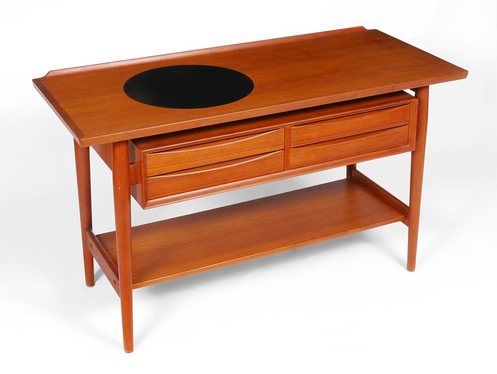 ARNE VODDER FOR SIBAST DANISH CONSOLE TABLE: ARNE VODDER FOR SIBAST DANISH CONSOLE TABLE: Teak console table designed by Arne Vodder for Sibast, top with inlaid black formica circle. 4 drawers over open lower shelf, Sibast label inside drawer. O