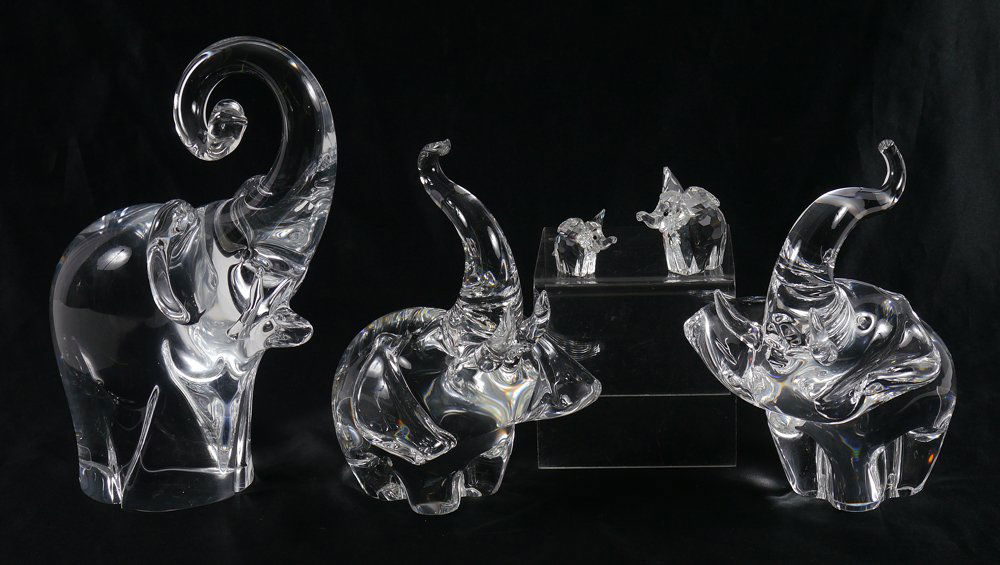 COLLECTION OF 5 CRYSTAL ELEPHANT FIGURES: COLLECTION OF 5 CRYSTAL ELEPHANT FIGURES: 5 pieces total to include 1) Oggetti Italy, 9 1/2" h. x 7". 2-3) Pair of Steuben, similar but not identical 7 1/4" h. x 5". 4-5) Pair of Swarovski, larger 2"