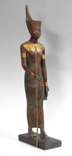 EGYPTIAN BRONZE FIGURE: MIXED METAL AND WOOD COPPER CLAD MARBLE EGYPTIAN FIGURE: Clad in copper and brass, 38 1/2"h. x 12" x 8 1/4" with wooden base.