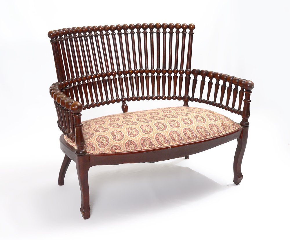 HUNZINGER LOLLIPOP DROP ARM SETTEE: HUNZINGER LOLLIPOP DROP ARM SETTEE: Frame in the classic Lollipop style by Hunzinger, shaped legs, paisley upholstery. Measures 32 1/2" h. x 39" x 27".