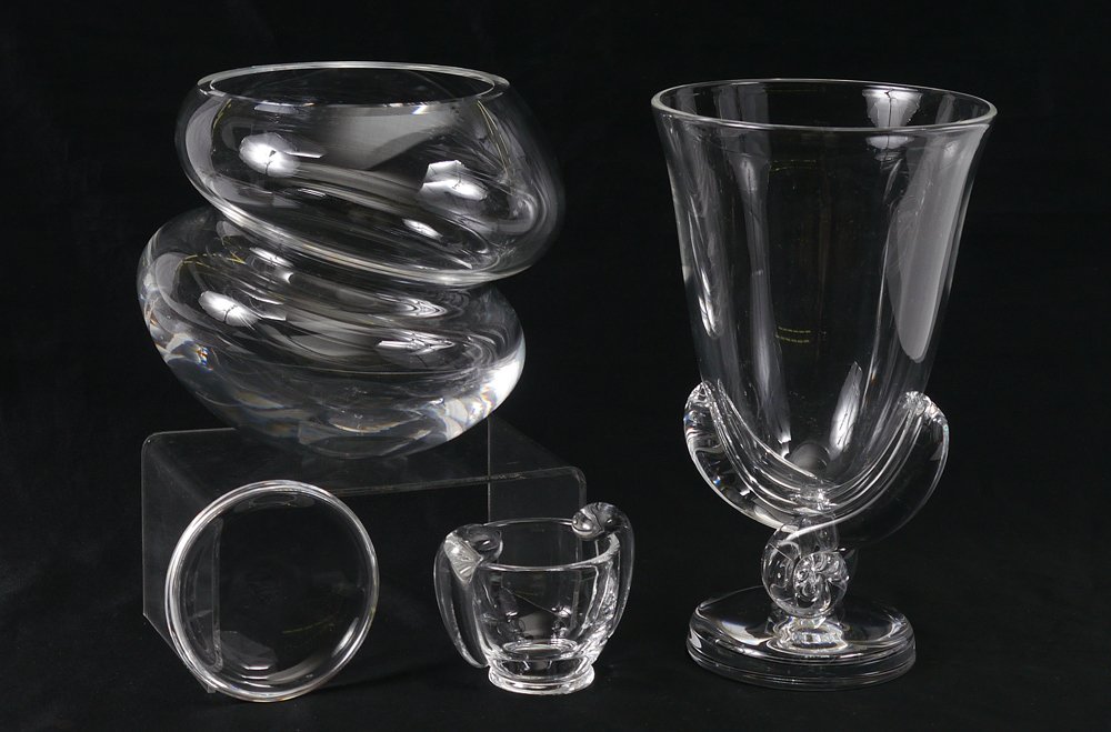 4 PIECE STEUBEN GLASS COLLECTION: 4 PIECE STEUBEN GLASS COLLECTION: To include 1) Freeform double globe form, signed, 5 3/4" h. x 6 1/4". 2) Footed vase with swirl pedestal, signed, 8 3/4" h. x 5 1/2". 3) Small handled glass, signed, 