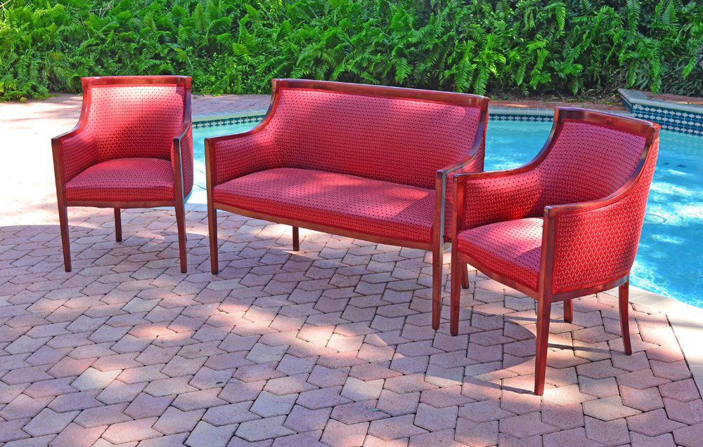 3 PIECE FRENCH STYLE PARLOR SET: 3 PIECE FRENCH STYLE PARLOR SET: Matching settee and arm chairs with shaped top rails and arms, tapered legs. Red crosshatch upholstery. Settee 36" h. x 50" x 24", chairs 35 1/4" x 24" x 22 1/2".