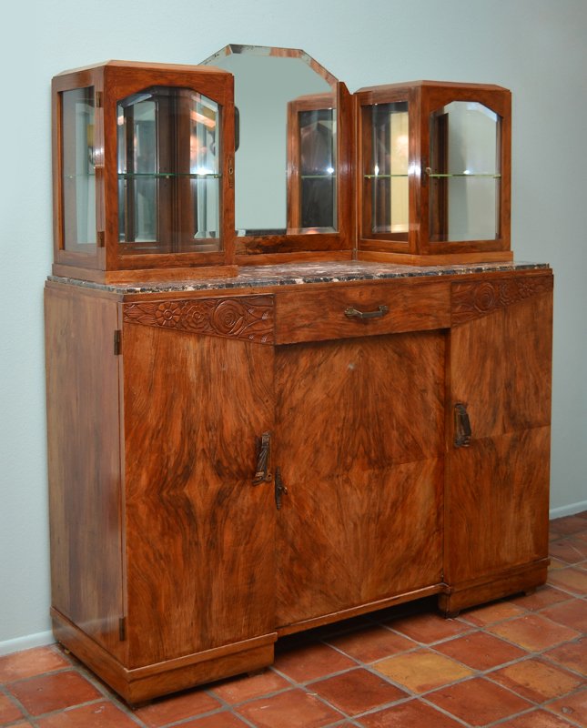 ART DECO WALNUT CARVED MARBLE TOP SIDE CABINET: FRENCH ART DECO WALNUT CARVED MARBLE TOP SIDE CABINET: Back with central mirror surmounted either side by glass shadowbox display boxes with single shelf and mirrored backs. Marble top over central dr