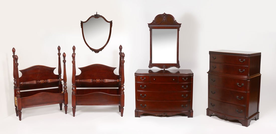 6 PIECE MAHOGANY BEDROOM SUITE: 6 PIECE MAHOGANY BEDROOM SUITE: Mid 2th century, 6 pieces total to include 2 twin BEDS with carved spire finials (headboard 56'' h. x 41 1/4'' x 3 1/4'', foot board 51 1/2'' h.); 3 drawer over 3 full