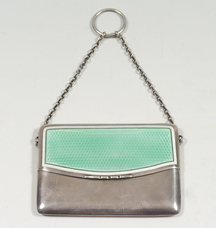 ENGLISH SILVER GUILLOCHE CARD CASE: ENGLISH SILVER GUILLOCHE CARD CASE: 1910 Birmingham hallmark, obscured makers mark. Green guilloche hinged lid, non silver hanging chain. Overall measures 2 3/4'' x 4'', approx. 3.8 troy oz. inclusive