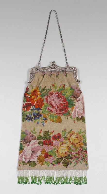VINTAGE BEADED PURSE W/ SILVER FRAME: VINTAGE SILVER FRAMED BEADED PURSE: Extra deep, brightly colored floral design with double fringe. The flower and urn embossed frame is stamped ''Made in Italy 800''. The lining is in fine condition.