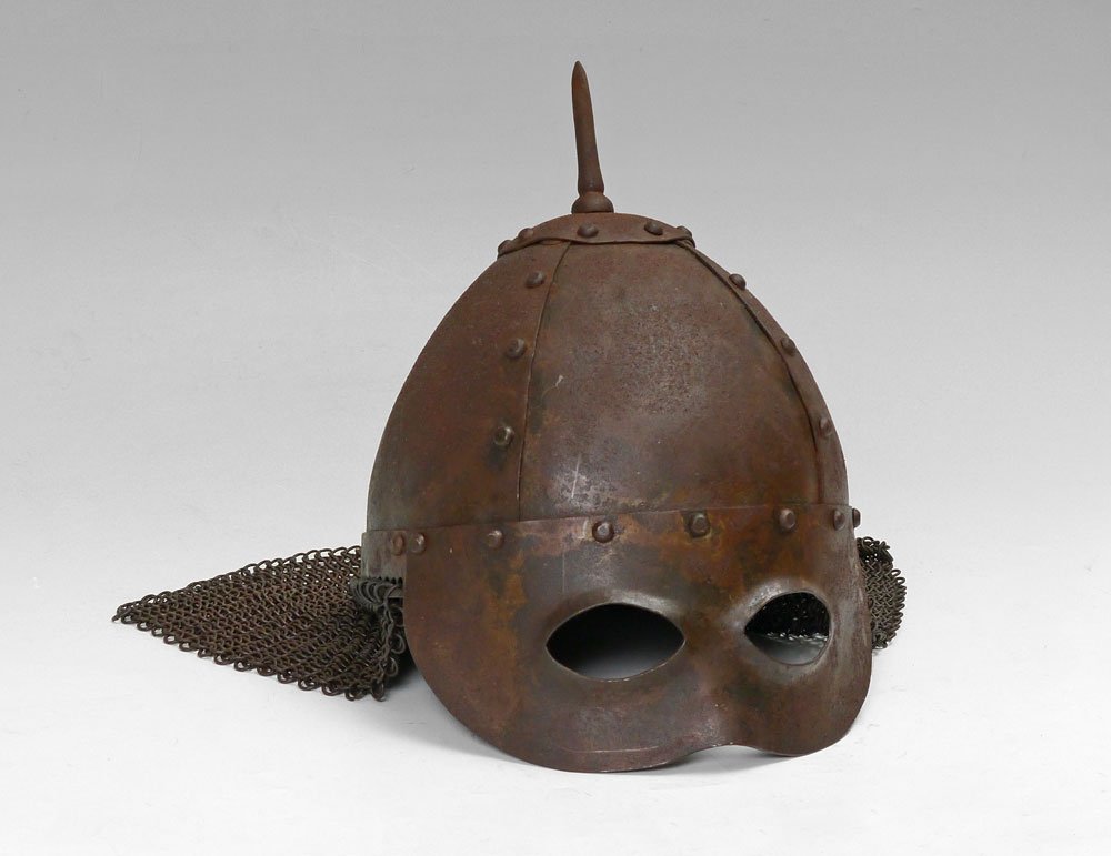 VICTORIAN EASTERN EUROPEAN MORTUARY HELMET: VICTORIAN EASTERN EUROPEAN MORTUARY HELMET: Victorian era copy of a earlier style iron or steel spiked helmet with eye mask and camail below. Spike measures 2 3/4'', overall measures 10 1/4'' h. x 8''