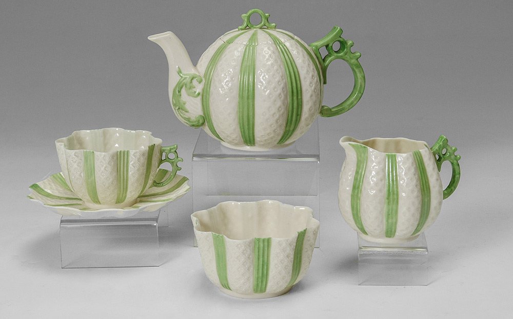 IRISH BELLEEK 5 O'CLOCK TEA SET: IRISH BELLEEK PORCELAIN ''5 O'CLOCK'' TEA SET: Black mark. Green decorated teapot (5 1/4''), creamer, sugar, cup and saucer.