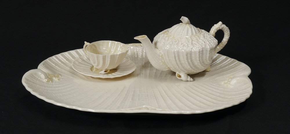 IRISH BELLEEK NEPTUNE TEA TRAY, POT, CUP & SAUCER: IRISH BELLEEK PORCELAIN NEPTUNE TEA TRAY: Sold with the Neptune teapot, cup and saucer. All are black mark. Tray measures 17" x 14 1/4".