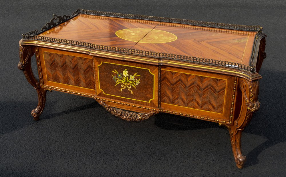 FRENCH STYLE INLAID COFFEE TABLE / BAR: FRENCH STYLE INLAID COFFEE TABLE / BAR: Inlaid top with central floral medallion, open work ormolu gallery, slides to reveal storage for bar ware, bottles and glasses. Parquetry and marquetry inlaid s