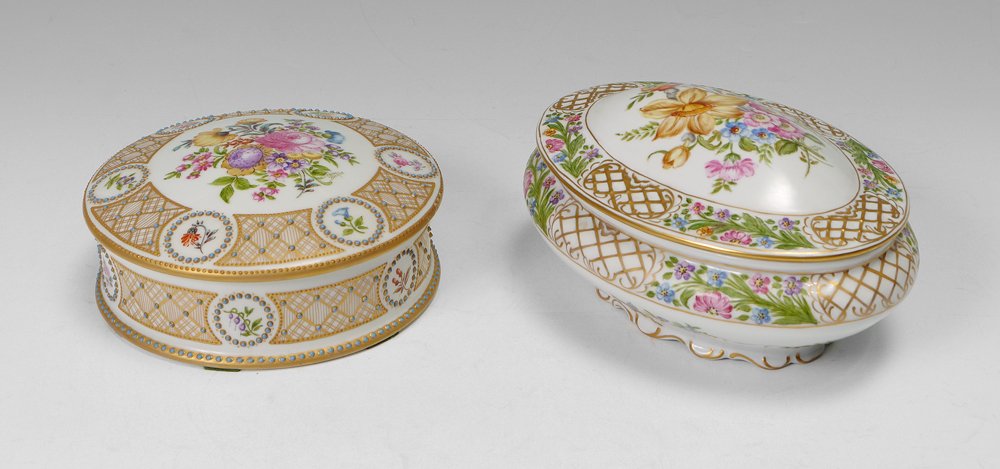 IRENE BECKER LIMOGES & SCHUMAN PORCELAIN BOXES: BECKER, Irene (American 1925-2014): Two porcelain boxes hand painted in the Dresden manner. 1) French Limoges round box, 2 1/4" x 6 1/2". 2) Schuman Bavarian oval box, 4" x 8 1/2". Both signed by the 