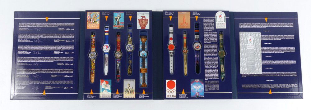 SWATCH HISTORICAL OLYMPIC WATCH SET: SWATCH HISTORICAL OLYMPIC WATCH SET: Limited edition set celebrating the 1996 Atlanta Summer Olympics with 8 watches commemorating assorted 20th century Olympics, in the presentation box. Presentation