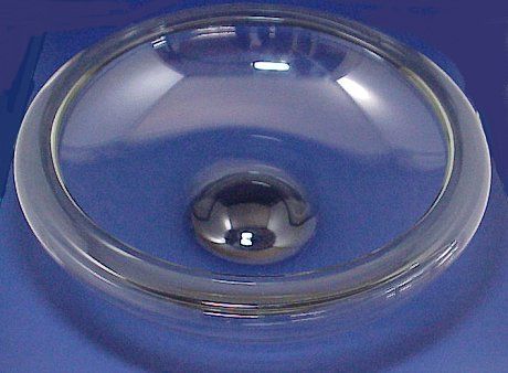 DANISH HOLMEGAARD ART GLASS BOWL HUGE: PER LUTKEN HOLMEGAARD BLOWN ART GLASS BOWL: Mid century Danish art glass at its best. Oversized glass bowl with a hint of smoky color. The rim folds in an inch, the bottom center has a domed center in