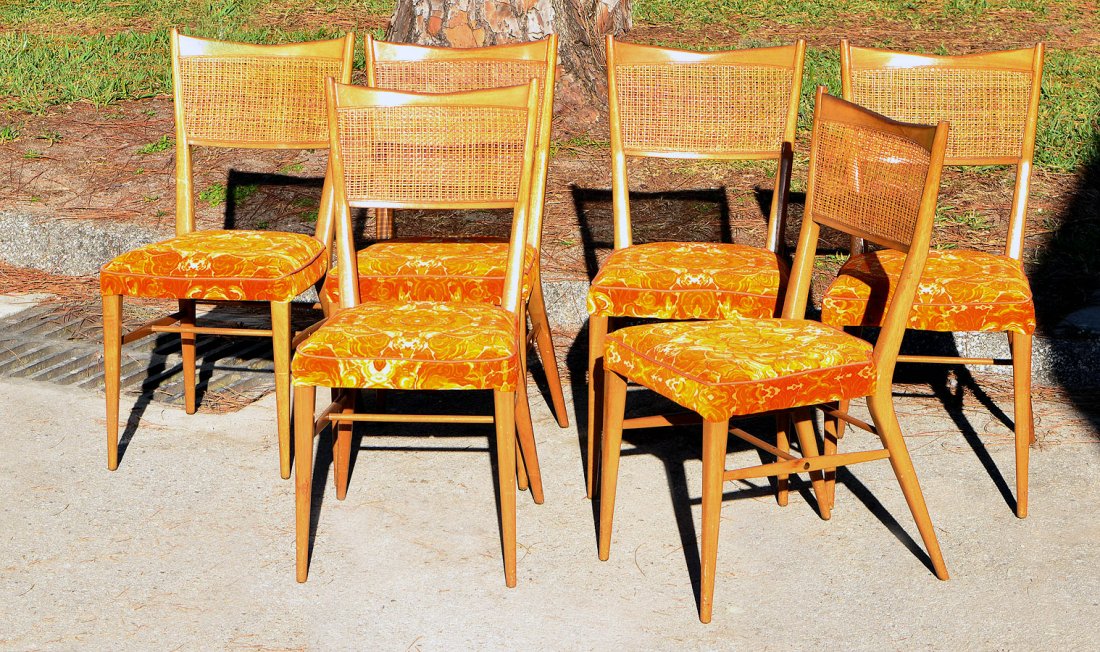 6 PAUL MCCOBB CONNOISSEUR CANE BACK CHAIRS: 6 PAUL MCCOBB CONNOISSEUR CANE BACK CHAIRS: Set of 6 side chairs from the Connoisseur Collection, shaped top rail, cane backs, bright orange floral upholstery. Original Paul McCobb labels, approx. 34 