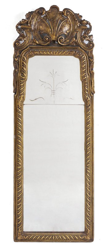 EARLY CARVED GILT WOOD PIER MIRROR: EARLY CARVED GILT WOOD PIER MIRROR: Carved gilt wood frame with foliate scroll motif, stylized leaf finial. Shaped beveled glass mirrors in 2 section, top section etched. Overall measures 55 1/8" h. x