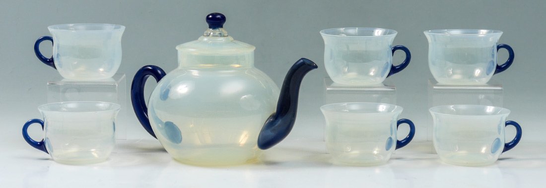 FRY OPALESCENT GLASS TEA SET: FRY OPALESCENT GLASS TEA SET: 7 pieces total to include teapot with lid, 6 3/8" h. x 9 1/2"; 6 cups, each 2 1/4" h. x 4 1/4".