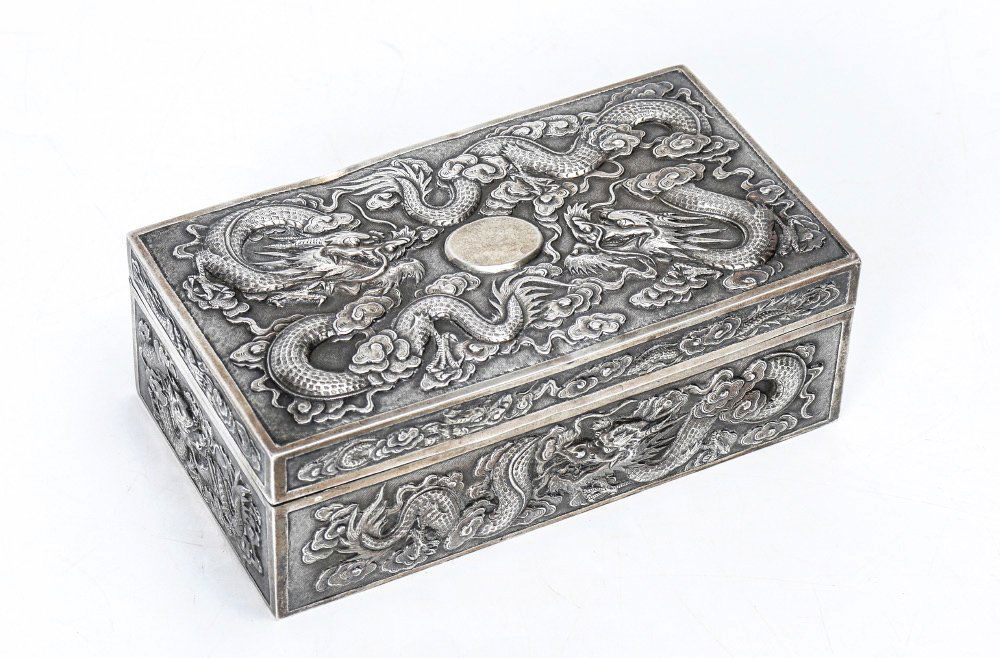 LUEN WO SHANGHAI CHINESE EXPORT SILVER BOX: LUEN WO SHANGHAI CHINESE EXPORT SILVER BOX: Circa late 19th to early 20th century, hinged lid, repousse dragons in clouds motif on all sides and lid, vermeil interior, marked on base with Chinese expo