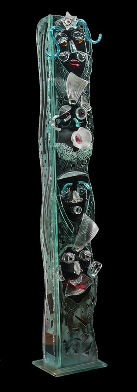 SUSAN PELISH FACE TOTEM ART GLASS SCULPTURE: PELISH, Susan, (American, 20th Century): 4 figural face totem with multi-hued frosted, etched, welded and upcycled glass. Overall measures 86 1/4'' h. x 14 1/4'' x 14 1/4''.