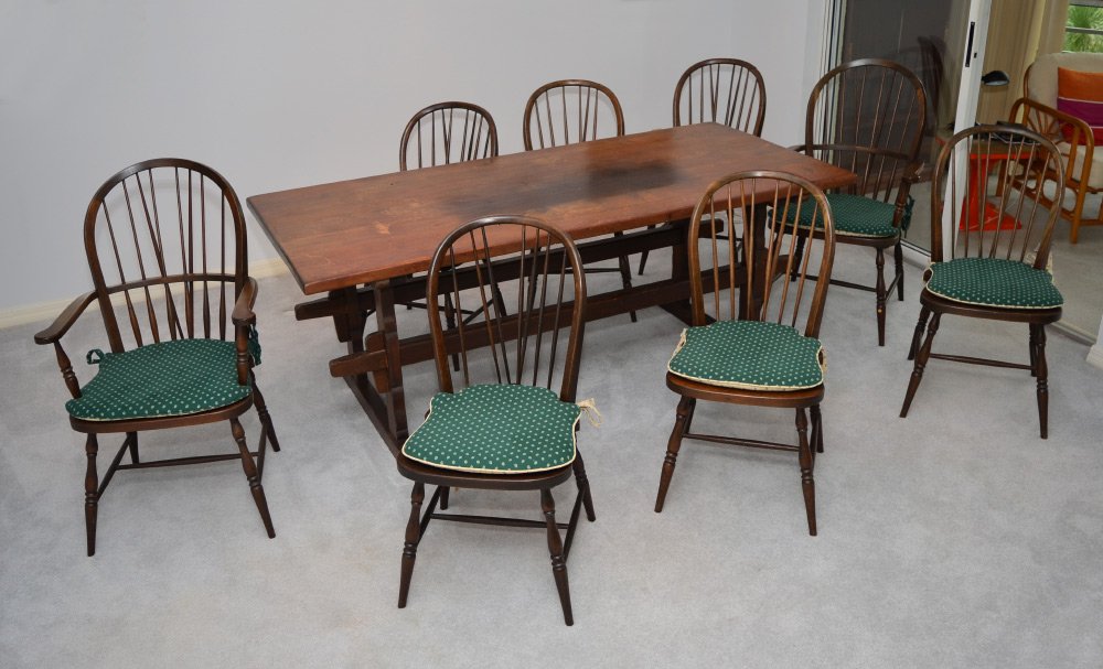 TRESTLE TABLE & 8 WINDSOR STYLE CHAIRS: TRESTLE TABLE & 8 WINDSOR STYLE CHAIRS: Trestle table with though tenon supports, overall measures 29 1/2" h. x 74 3/4" x 33 3/4". Sold with 8 Winsdor style chairs, 2 am chairs measure 38 1/2" h. x 23