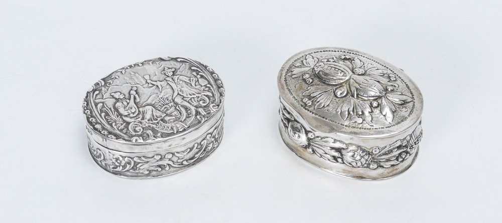 2 EUROPEAN SILVER PILL OR SNUFF BOXES: 2 EUROPEAN SILVER PILL OR SNUFF BOXES: 2 piece total to include 1) Repousse with outdoor genre scene on hinged lid and interior, foliate scroll sides. Marked with importers mark for John George Smith,