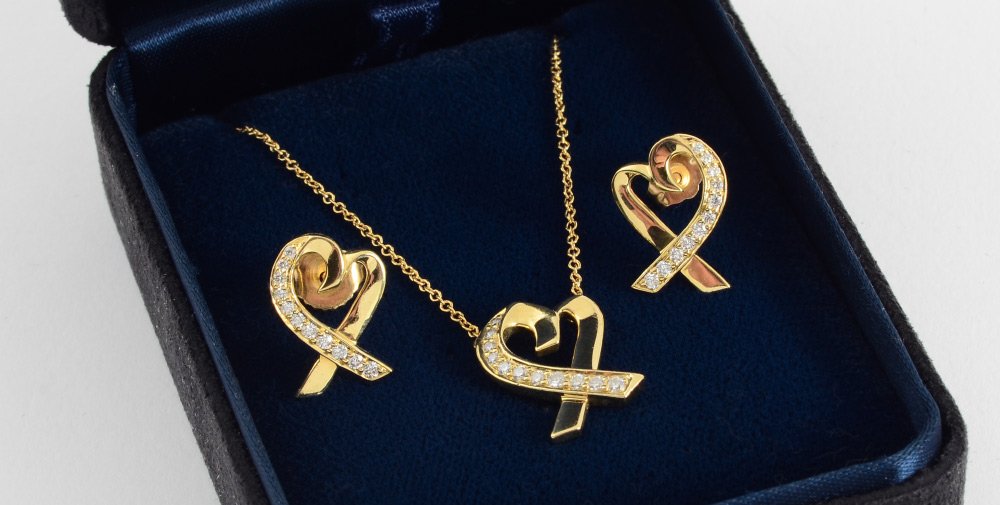 PALOMA PICASSO TIFFANY LOVING HEARTS: PALOMA PICASSO TIFFANY & CO. EARRINGS & NECKLACE SUITE: Loving Hearts Collection. 18K yellow gold with .40 Ct diamonds, VVS clarity and F color. The chain is 16", the hearts are .5". Weight approx. 6.