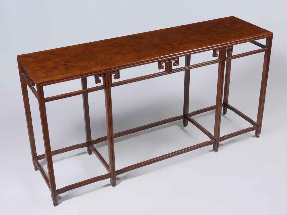 BAKER ORIENTAL MOTIF SOFA TABLE: BAKER ORIENTAL MOTIF SOFA TABLE: Burl veneer top, thin rail oriental style base, original Baker Furniture tag and numbered 1487 under top. Overall measures 27 7/8'' h. x 54'' x 14 1/2''.