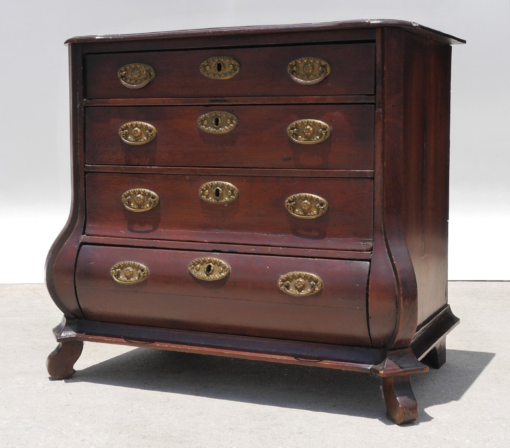 19TH CENTURY DUTCH OAK COMMODE: 19TH CENTURY DUTCH OAK COMMODE: Early 19th century, shaped top over 3 drawers over 4th swell front drawer, brass hardware, on 4 shaped feet. 31 3/4" h. x 35" x 21 1/2".