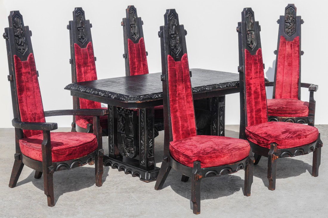 MADERAS DE SANTA BARBARA GOTHIC CARVED DINING SET: MADERAS DE SANTA BARBARA GOTHIC REVIVAL CARVED TABLE & CHAIRS: 8 pieces total carved in the Gothic Revival style to include 1) Table with edges carved with panels, carved double pedestal base with her