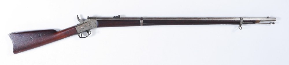 REMINGTON MODEL 1871 ROLLING BLOCK RIFLE: US SPRINGFIELD REMINGTON MODEL 1871 ROLLING BLOCK RIFLE: Produced by Springfield Armory under agreement with Remington, dated 1872. .50/70 center fire caliber round barrel, nice bore. Walnut stocks wi