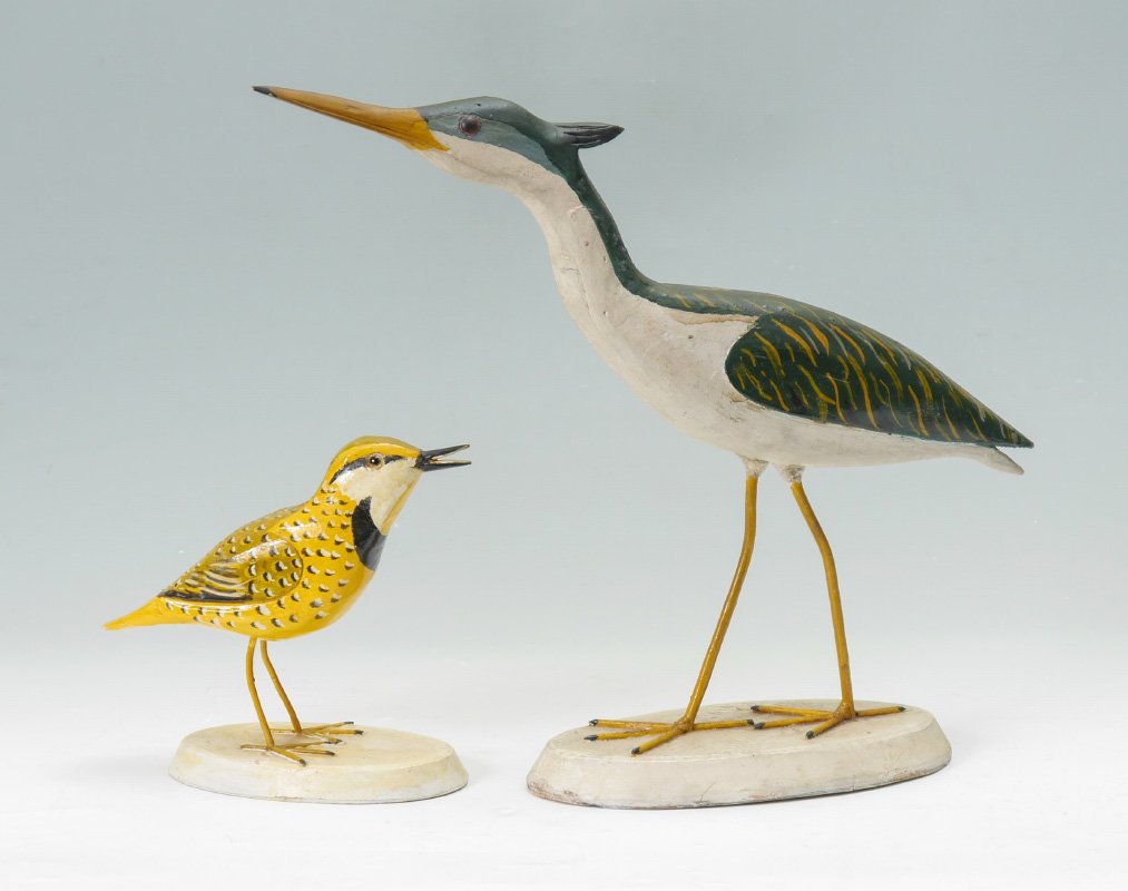 PAIR ERNEST STECK SHOREBIRD DECOY CARVINGS: PAIR ERNEST STECK SHOREBIRD DECOY CARVINGS: 2 pieces total, both signed on base by Ernest Steck of East Quogue, NY to include 1) Heron, 15 3/4'' h. x 18''. 2) Plover, 8'' h. x 8 1/4''.