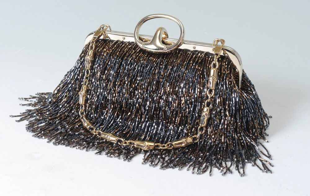 TOM FORD GUCCI BEADED FRINGE BAG PURSE: GUCCI BY TOM FORD BEADED EVENING BAG: Satin body covered in dark blue and brown bead fringe. Removable gold tone metal bamboo chain and latch. Measures approx. 5'' h. x 9'' x 2''.