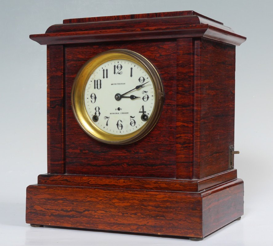 SETH THOMAS ADAMANTINE SENORA CHIME MANTLE CLOCK: SETH THOMAS ADAMANTINE SENORA CHIME MANTLE CLOCK: Wood case with adamantine finish, porcelain dial with Arabic numerals marked Seth Thomas, Senora Chimes. Time and strike movement with 4 Senora Chime