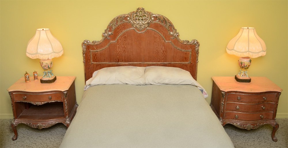 FRENCH STYLE MARBLE TOP SIDE TABLES & HEADBOARD: PAIR FRENCH STYLE MARBLE TOP NIGHT STANDS AND HEADBOARD: Each of the stands with shaped pink marble tops, one with 3 drawer base, the other with single drawer over open storage. Canted corners with ap