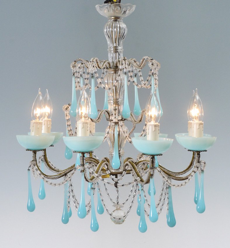 BLUE OPALINE GLASS CHANDELIER: BLUE OPALINE GLASS CHANDELIER: 8 light brass frame with cut glass center, clear glass beads strands and florettes, opaline glass drops and bobeche. Overall 21" h. x 19 1/2".