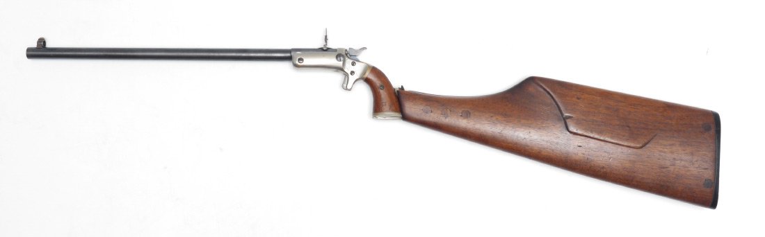 J. STEVENS ARMS ANTIQUE NEW MODEL POCKET RIFLE #40: J. STEVENS ARMS ANTIQUE NEW MODEL POCKET RIFLE #40 WITH WOOD STOCK: Antique pistol with a 15" part octagon, part round approx 22 cal. barrel marked J. Stevens A & T Co. Chicopee Falls Mass Pat. Sept. 