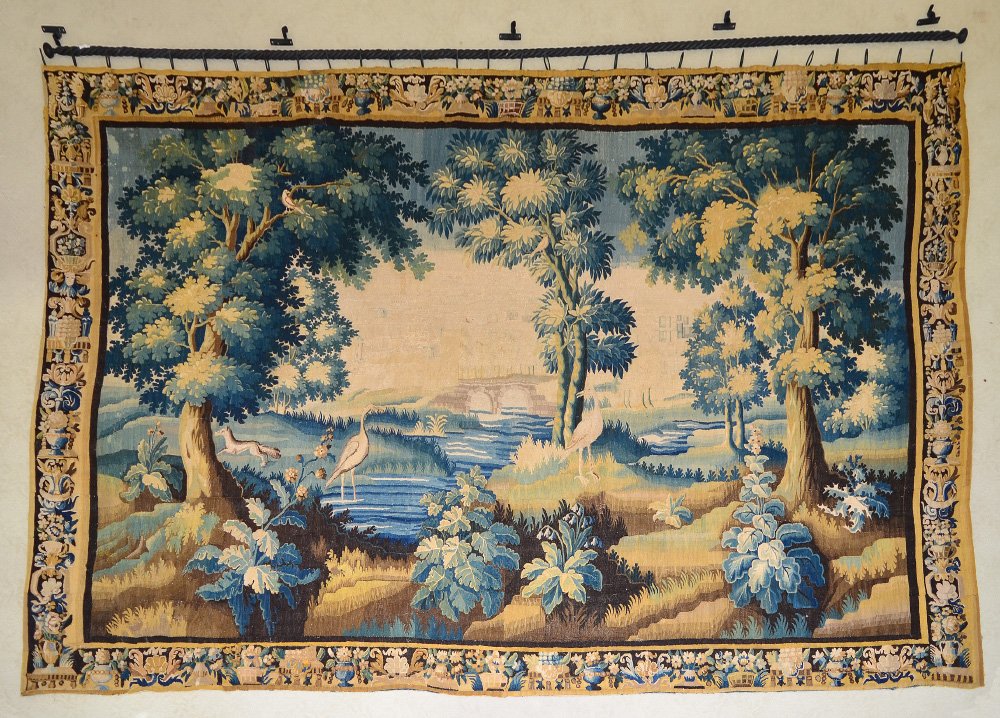 FRENCH AUBUSSON TAPESTRY, 9' x 13': FRENCH AUBUSSON TAPESTRY, 9' x 13': Turn of the last century, delft blue, tan & white landscape. Border overflowing with urns, fruit and flowers. Fully backed, with rings and bar for hanging.